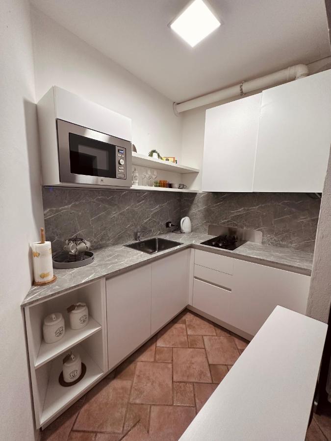 La Casa Del Corso Apartment Arona Bagian luar foto